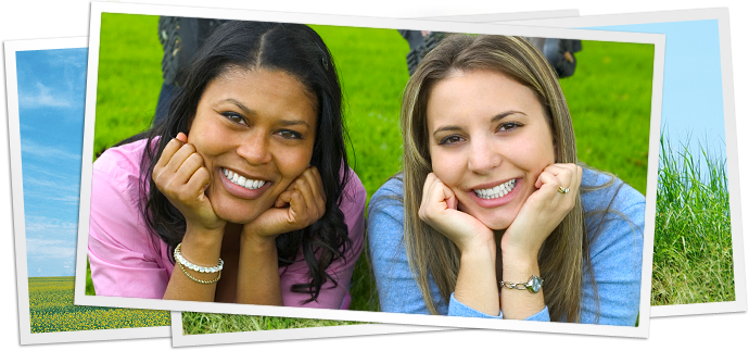 photo of two young women in grass