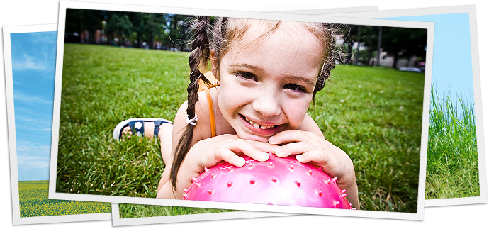 photo of girl with ball in grass