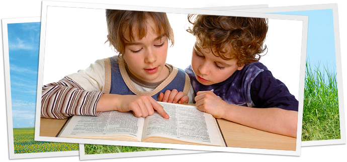 photo of two children looking at dictionary