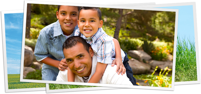 photo of father and two sons playing outside